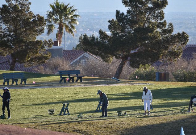 Neighbors playing a round of golf